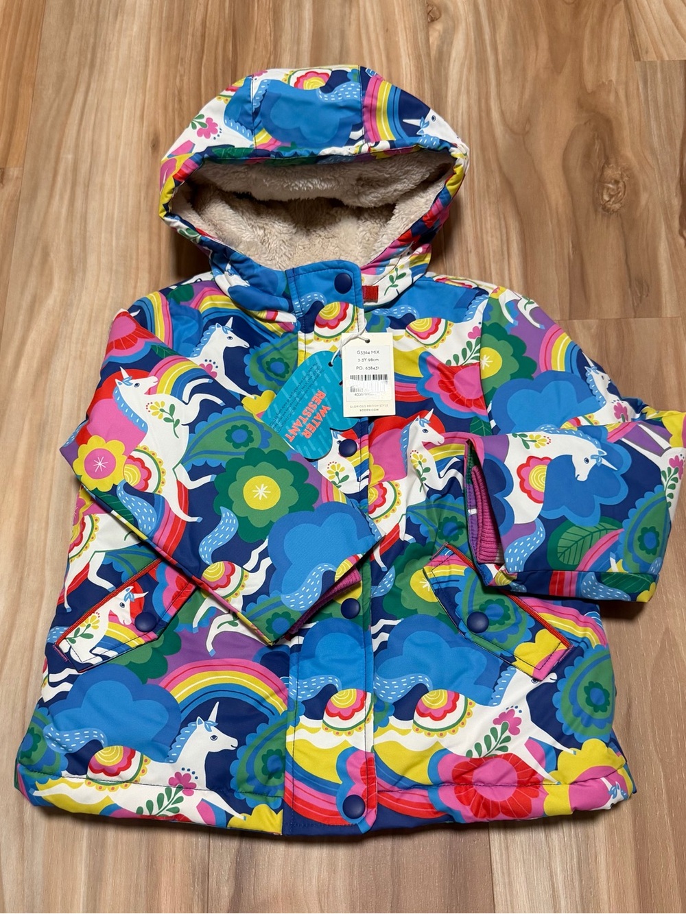 Mini Boden Bright Unicorn Print Hooded Puffer Jacket - Blue, Pink, Yellow, Green